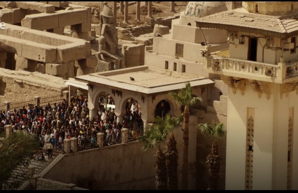 Abu Haggag Mosque built within the ancient Luxor Temple complex surrounded by statues and ruins in Luxor Egypt