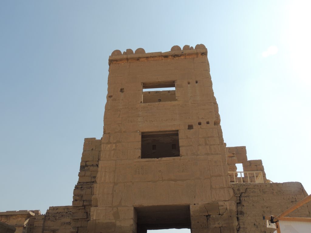 Ancient stone nilometer tower at Kom Ombo Temple used to measure Nile flood levels in Egypt